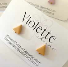 Load image into Gallery viewer, A warm yellow triangular shaped polymer clay stud with gold accent on backing card
