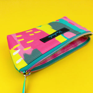 unzipped pink, yellow, aqua fabric all purpose zip pouch for Cosmetics, Sunglasses, keys or cash with pink check fabric lining