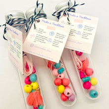 Load image into Gallery viewer, DIY Colourful Timber Bead Necklace Kit with fabric flower in Test Tube packaging and tag
