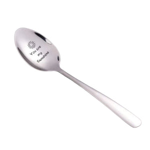 Silver dessert spoon with You are my sunshine engraved in the spoon